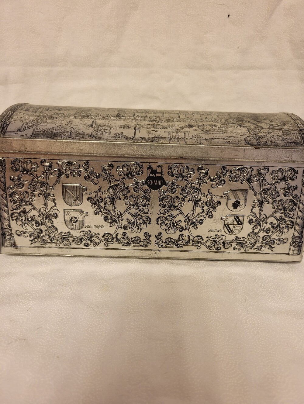 E. Otto  Schmidt German     Decorative Tin Chest with Ornate Crest Detailing